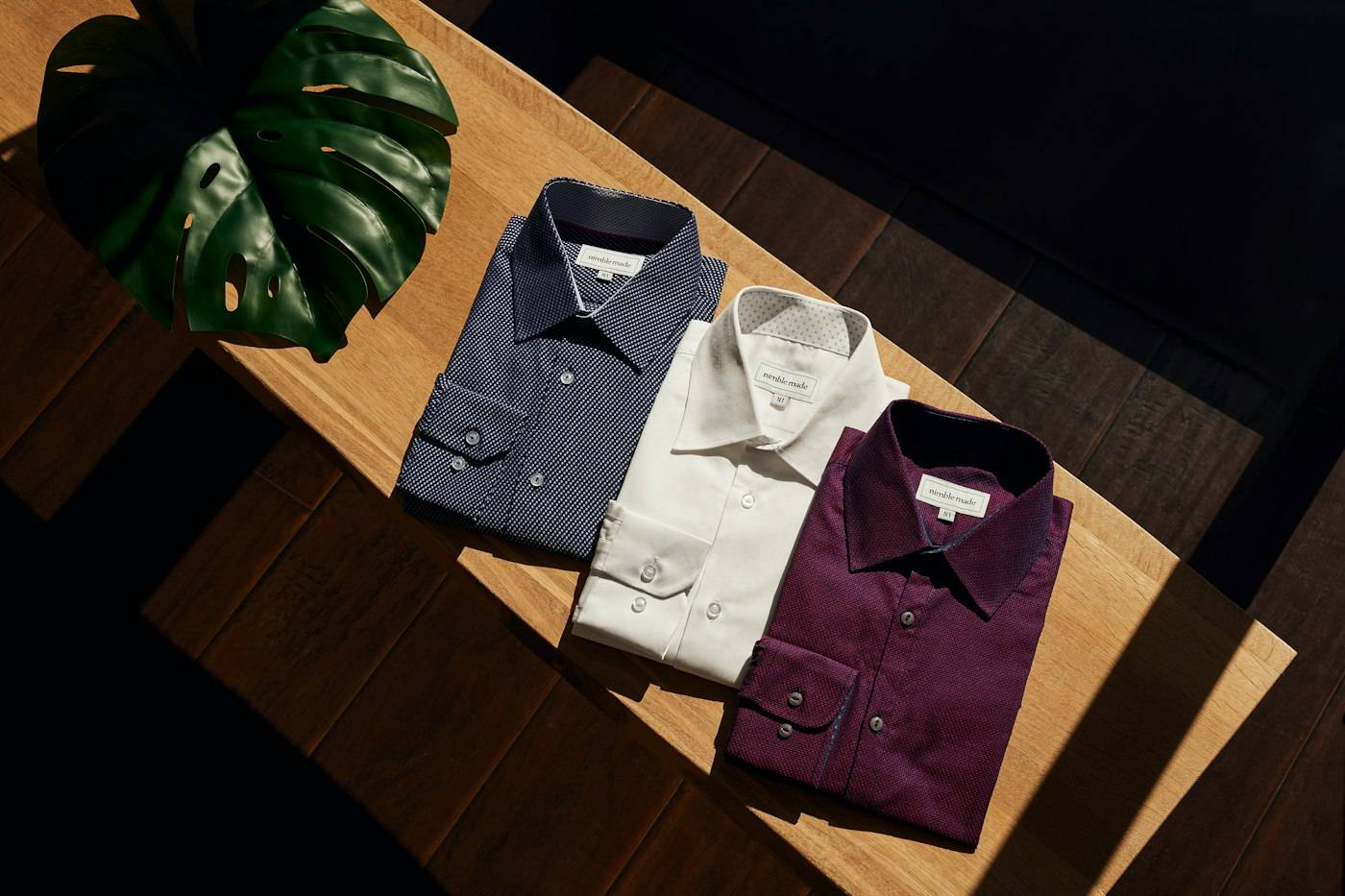 A selection of shirts on a clothing rail